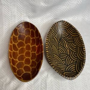Hand carved wood bowl painted animal print.